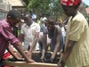 Kids making briqueets